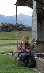 Angie Practices her Ukulele at Dingleburn Station on the Land of the Long White Cloud Ride with Wild Womens Expeditions and Adventure Horse Trekking New Zealand