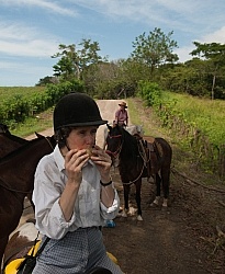 Louise eating Cantaloupe on the Trail