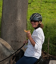 Ali eating Cantaloupe on the Trail