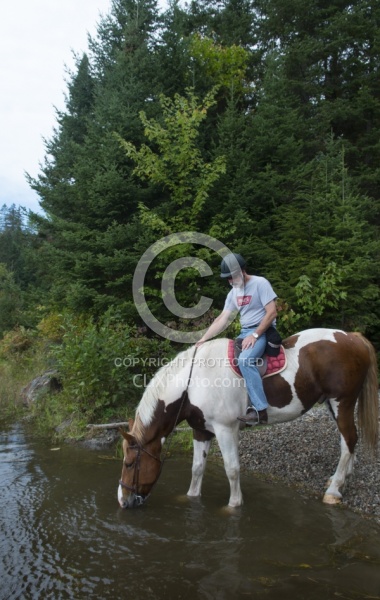 Major Having a Drink at Voyageur Bay at Horse Country Campground